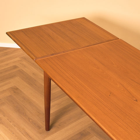 Danish dining table in teak and walnut