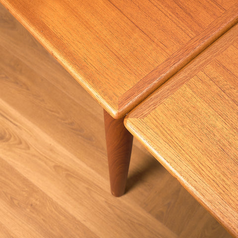 Danish dining table in teak and walnut