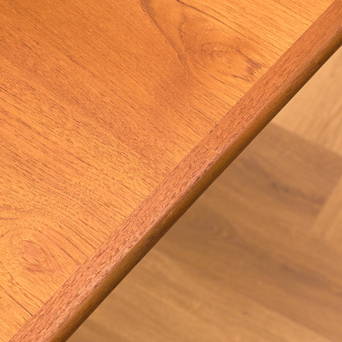 Danish dining table in teak and walnut