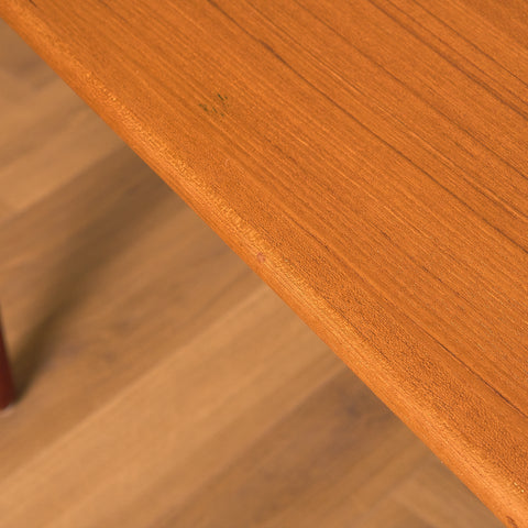 Danish dining table in teak and walnut