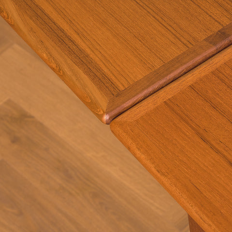 Danish dining table in teak and walnut