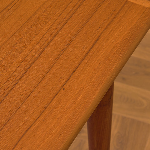 Danish dining table in teak and walnut