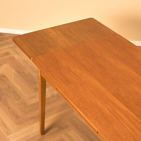Danish dining table in teak and beech