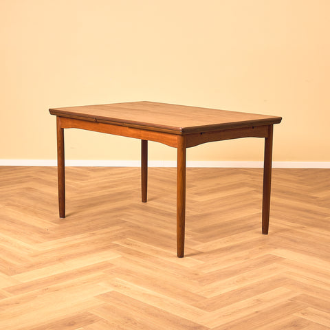 Danish dining table in teak and walnut