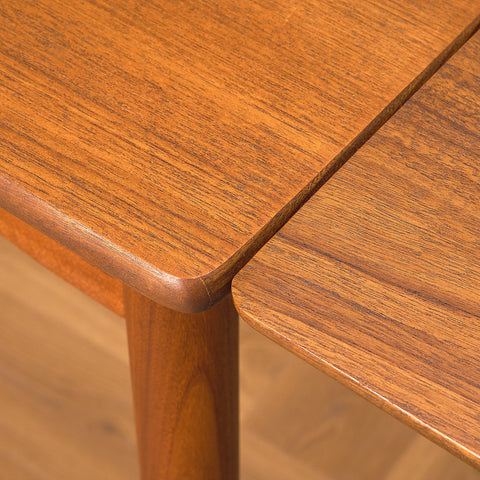 Danish dining table in teak and walnut