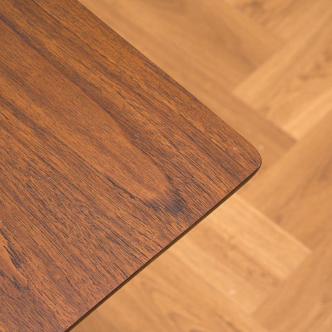 Danish dining table in teak and walnut