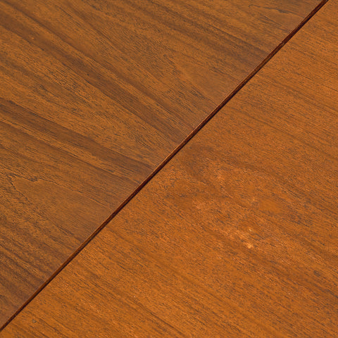 Danish dining table in teak and walnut