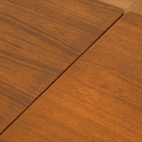 Danish dining table in teak and walnut