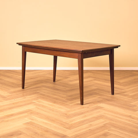 Danish dining table in teak and walnut