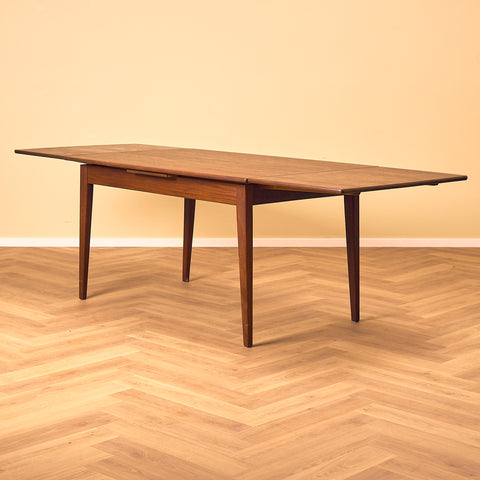 Danish dining table in teak and walnut