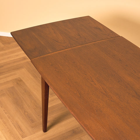 Danish dining table in teak and walnut