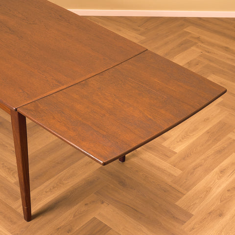 Danish dining table in teak and walnut