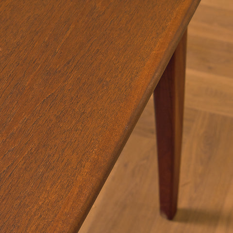 Danish dining table in teak and walnut