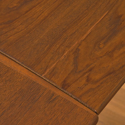 Danish dining table in teak and walnut