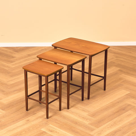 Danish set of nest of tables in teak and walnut