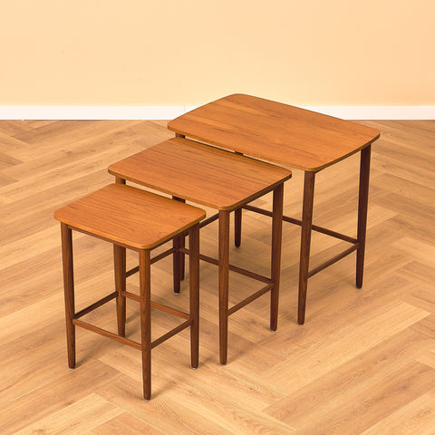 Danish set of nest of tables in teak and walnut