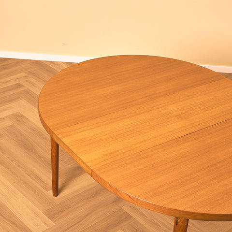 Danish round dining table in teak