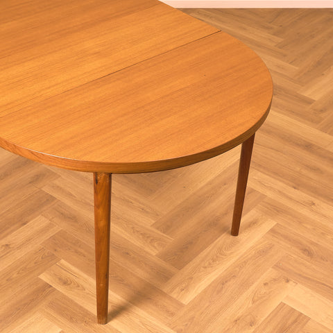 Danish round dining table in teak