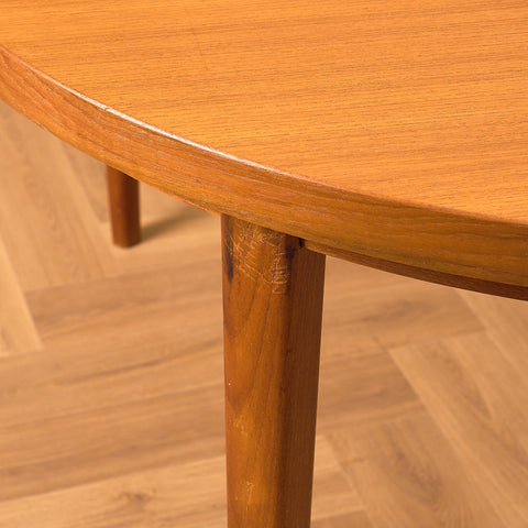 Danish round dining table in teak