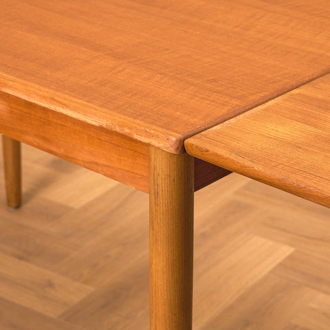 Danish dining table in teak and walnut