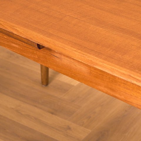 Danish dining table in teak and walnut