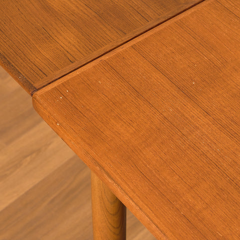 Danish dining table in teak and walnut