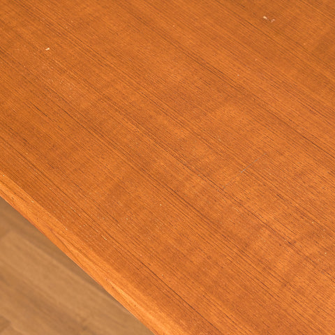 Danish dining table in teak and walnut