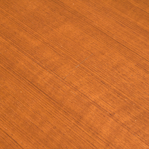 Danish dining table in teak and walnut