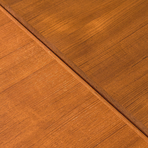 Danish dining table in teak and walnut
