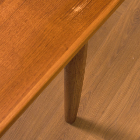 Danish dining table in teak and walnut
