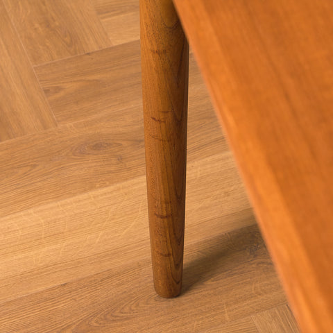 Danish dining table in teak and walnut