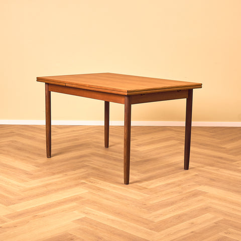 Danish dining table in teak and walnut