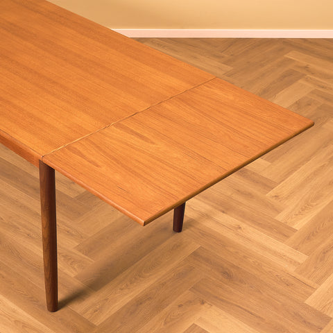 Danish dining table in teak and walnut