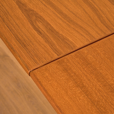 Danish dining table in teak and walnut