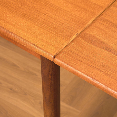 Danish dining table in teak and walnut