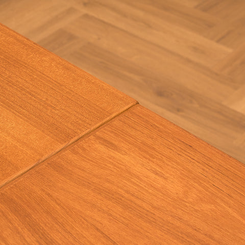 Danish dining table in teak and walnut