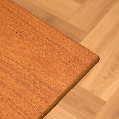 Danish dining table in teak and walnut