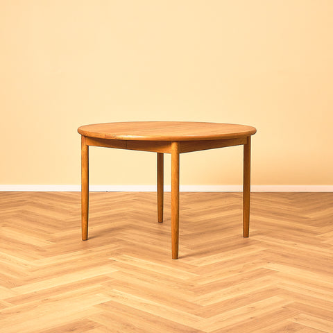 Extendable Round Teak Dining Table
