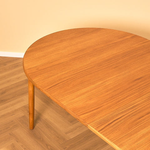 Extendable Round Teak Dining Table