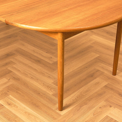 Extendable Round Teak Dining Table