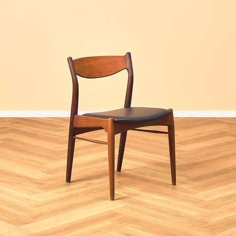 Danish dining chairs in teak and walnut by Ærthøj Jensen & Mølholm