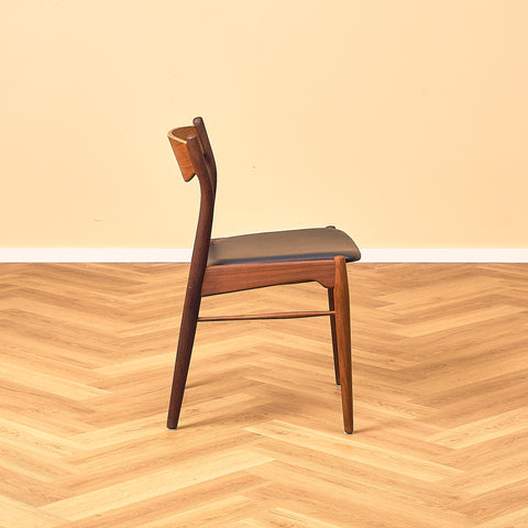 Danish dining chairs in teak and walnut by Ærthøj Jensen & Mølholm