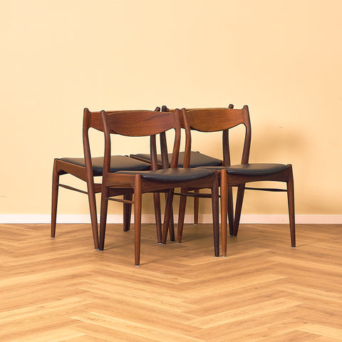 Danish dining chairs in teak and walnut by Ærthøj Jensen & Mølholm