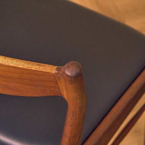 Danish dining chairs in teak and walnut by Ærthøj Jensen & Mølholm