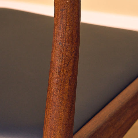Danish dining chairs in teak and walnut by Ærthøj Jensen & Mølholm