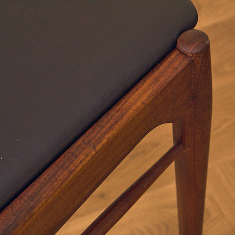 Danish dining chairs in teak and walnut by Ærthøj Jensen & Mølholm
