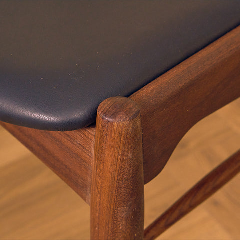 Danish dining chairs in teak and walnut by Ærthøj Jensen & Mølholm