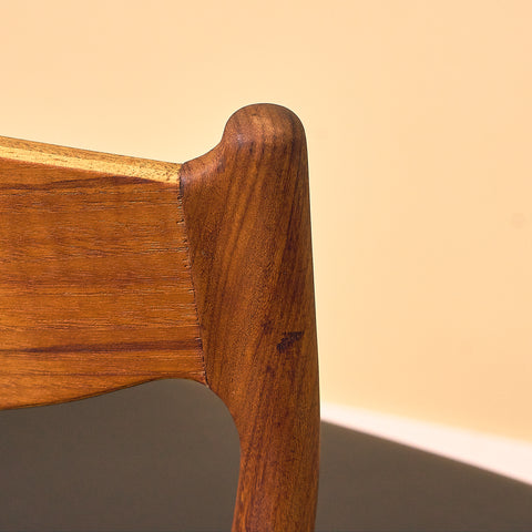 Danish dining chairs in teak and walnut by Ærthøj Jensen & Mølholm