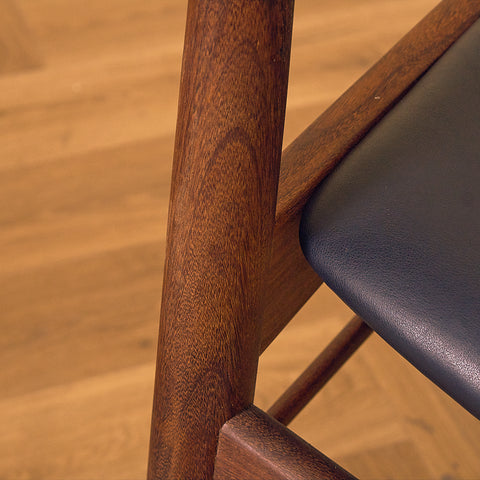 Danish dining chairs in teak and walnut by Ærthøj Jensen & Mølholm