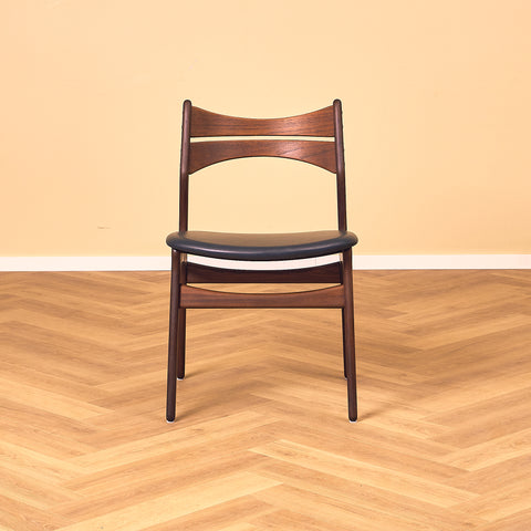Danish dining chairs in walnut and teak by Erik Buch for Chr. Christensen Møbelfabrik, model 310